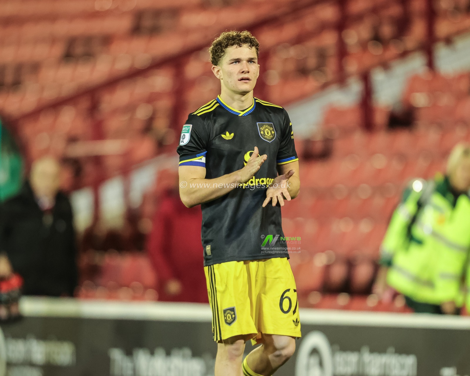 Jacob Devaney of Manchester United applauds the fans after the final whistle during the The Vertu Trophy Group D match Barnsley vs Manchester United U21 at Oakwell, Barnsley, United Kingdom, 21st October 2025

(Photo by Richard Bierton/News Images)