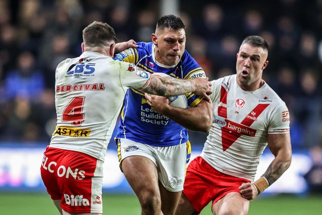 Ryan Hall of Leeds Rhinos is tackled by Mark Percival of St. Helens during the Betfred Super League play-off Eliminator 1 match Leeds Rhinos vs St Helens at Headingley Stadium, Leeds, United Kingdom, 27th September 2025

(Photo by Alfie Cosgrove/News Images)