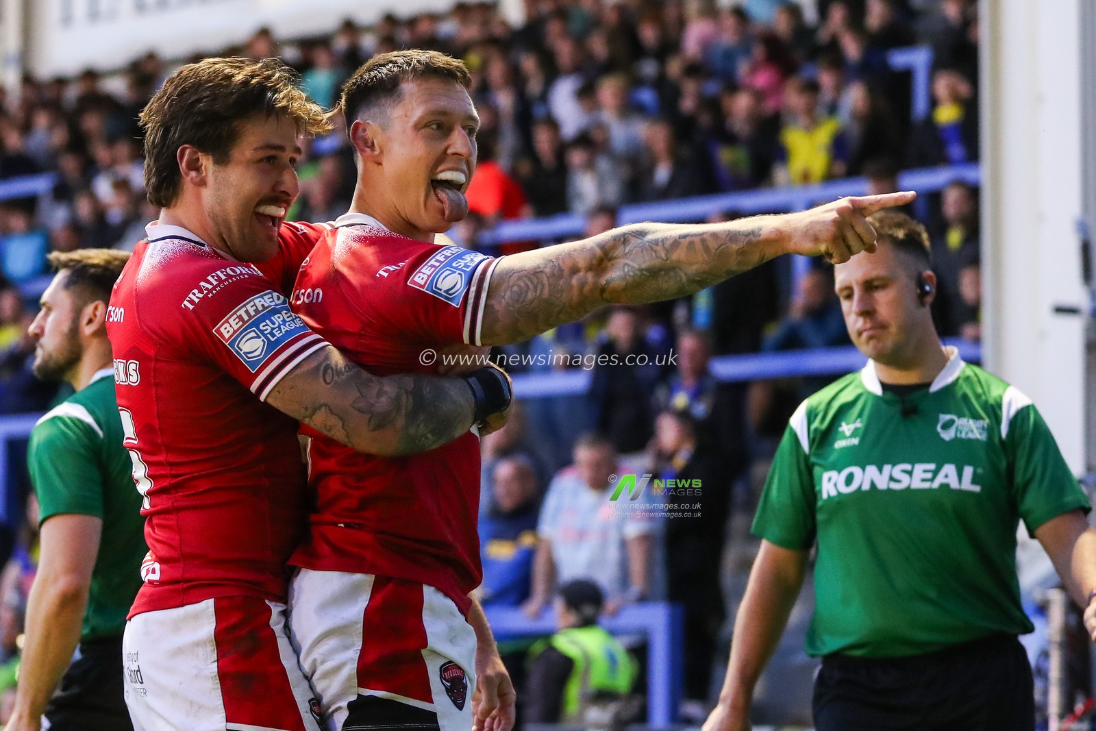 Deon Cross of Salford Red Devils celebrates his try to make it 8-23 during the Betfred Super League Round 14 match Warrington Wolves vs Salford Red Devils at Halliwell Jones Stadium, Warrington, United Kingdom, 14th June 2024

(Photo by Gareth Evans/News Images)