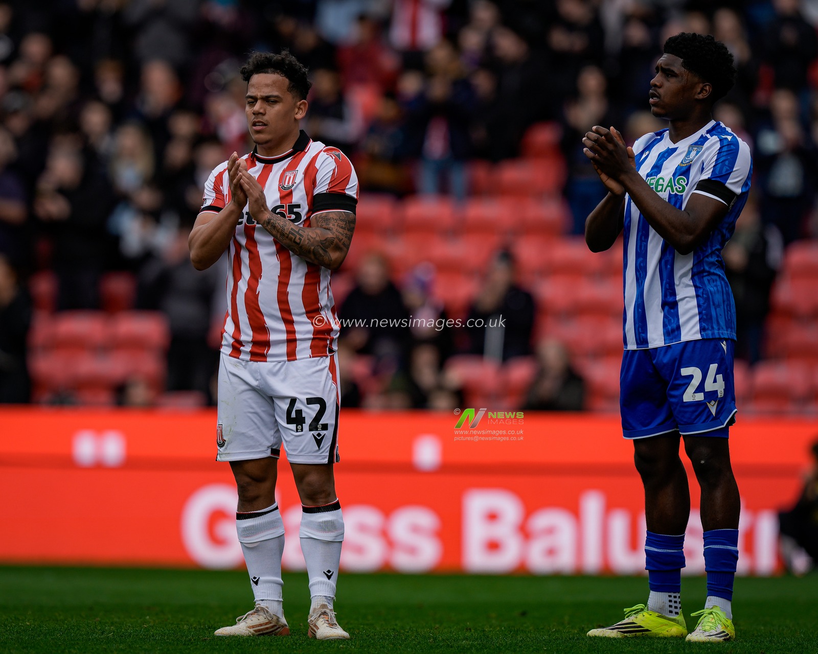 Million Manhoef of Stoke City and Jaden Heskey of Sheffield Wednesday  applauds during the 8th minute as a tribute to the late Oliver Royles during the Sky Bet Championship match Stoke City vs Sheffield Wednesday at Bet365 Stadium, Stoke On Trent, United Kingdom on 03 April 2026

(Photo by Maynard Manyowa/News Images)