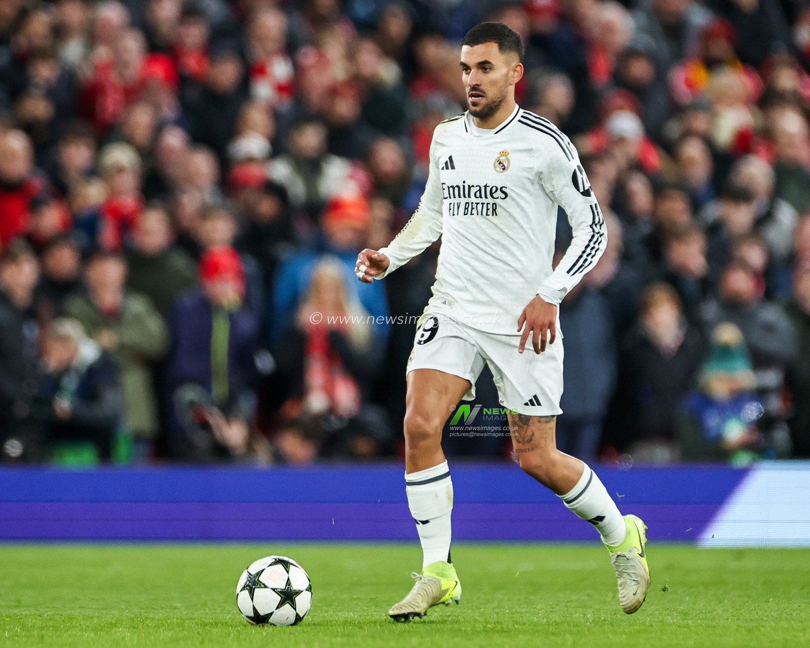 Dani Ceballos of Real Madrid runs with the ball during the UEFA Champions League, League Phase MD5 Liverpool v Real Madrid at Anfield, Liverpool, United Kingdom, 27th November 2024

(Photo by Mark Cosgrove/News Images)