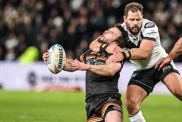 Joe Mellor of Bradford Bulls is tackled by the neck by Aidan Sezer of Hull FC during the Betfred Super League round 1 match Hull FC vs Bradford Bulls at MKM Stadium, Hull, United Kingdom on 14 February 2026

(Photo by Alfie Cosgrove/News Images)