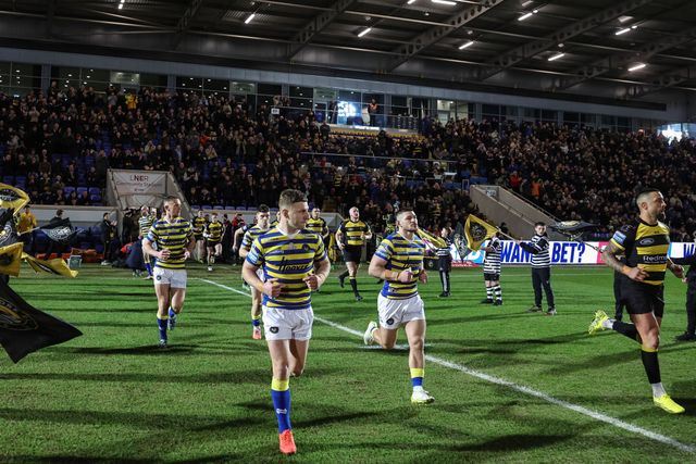 George Williams of Warrington Wolves leads his team mates out during the Betfred Super League Round 4 match York Knights vs Warrington Wolves at LNER Community Stadium, York, United Kingdom on 06 March 2026

(Photo by Mark Cosgrove/News Images)