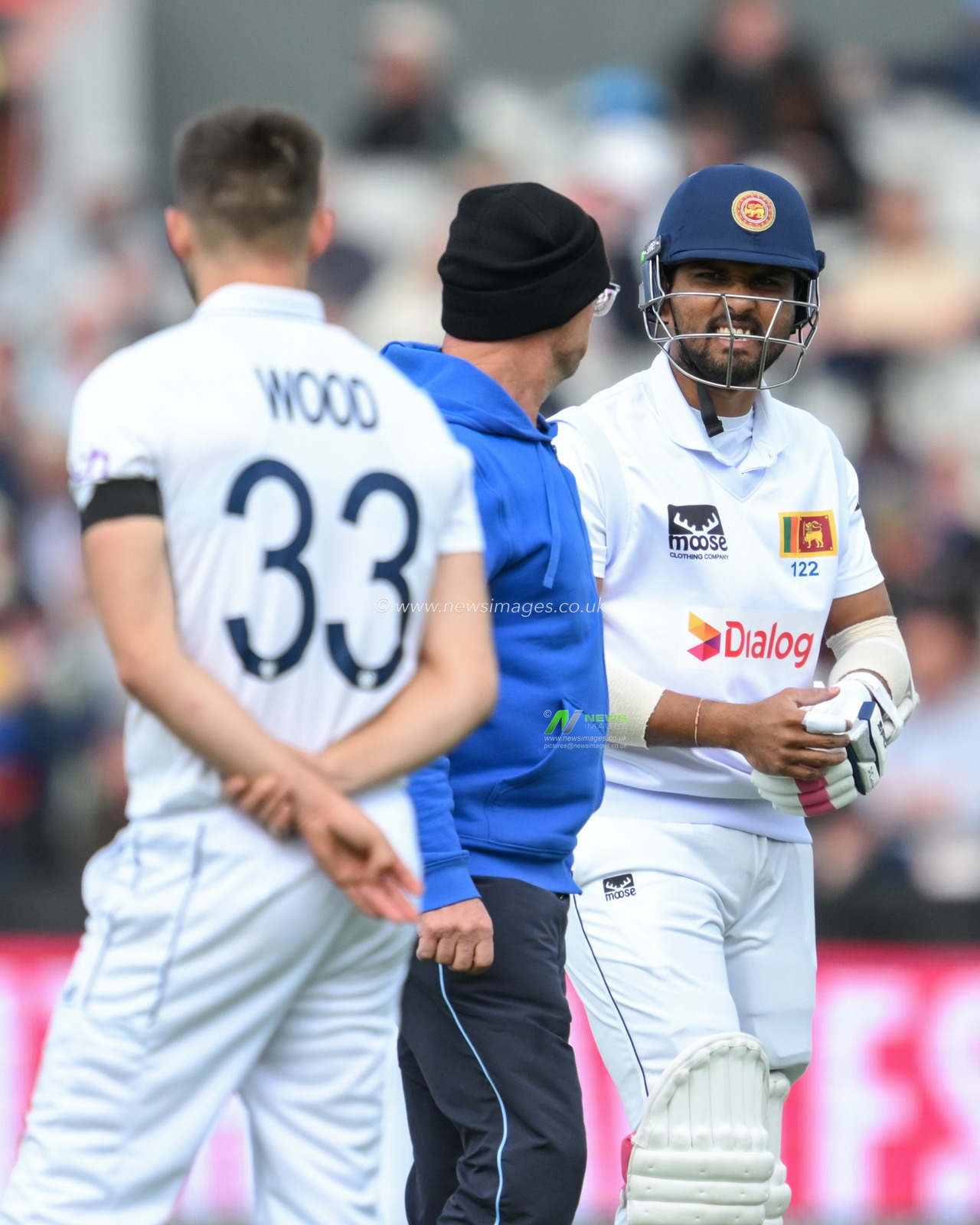 Dinesh Chandimal of Sri Lanka leaves the pitch with an injury from a bouncer ball from Mark Wood of England during the England Men v Sri Lanka 1st Rothesay Test Match Day 3 at Old Trafford, Manchester, United Kingdom, 23rd August 2024

(Photo by Craig Thomas/News Images)