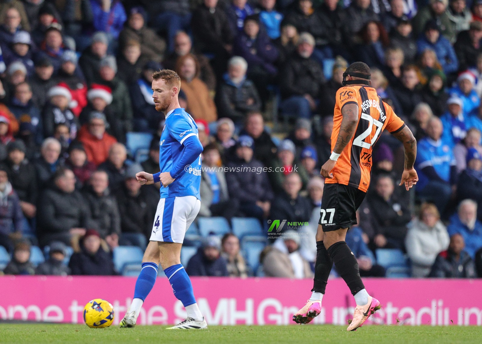Tom Naylor of Chesterfield passes the ball during the Sky Bet League 2 match Chesterfield vs Barnet at SMH Group Stadium, Chesterfield, United Kingdom, 13th December 2025

(Photo by Richard Bierton/News Images)

*** GER AUT SUI OUT ***