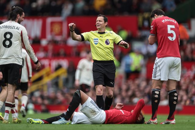 Referee Darren England checks on Casemiro of Manchester United after a head injury during the Premier League match Manchester United vs Liverpool at Old Trafford, Manchester, United Kingdom on 03 May 2026

(Photo by Mark Cosgrove/News Images)