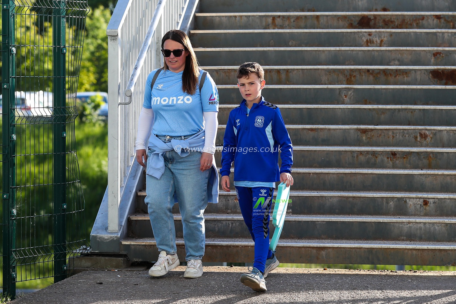 Coventry City fans make their way to the stadium ahead of the Sky Bet Championship Palyoff Semi-final match Coventry City vs Sunderland at Coventry Building Society Arena, Coventry, United Kingdom, 9th May 2025

(Photo by Gareth Evans/News Images)