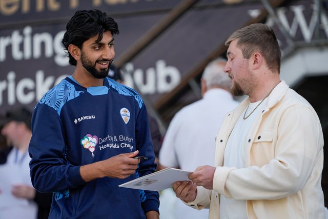 Shoaib Bashir of Derbyshire signs an autograph for a fan during the County Championship Division Two Derbyshire vs Northamptonshire day one match at The Central Co-Op County Ground, Derby, United Kingdom on 08 May 2026

(Photo by Maynard Manyowa/News Images)