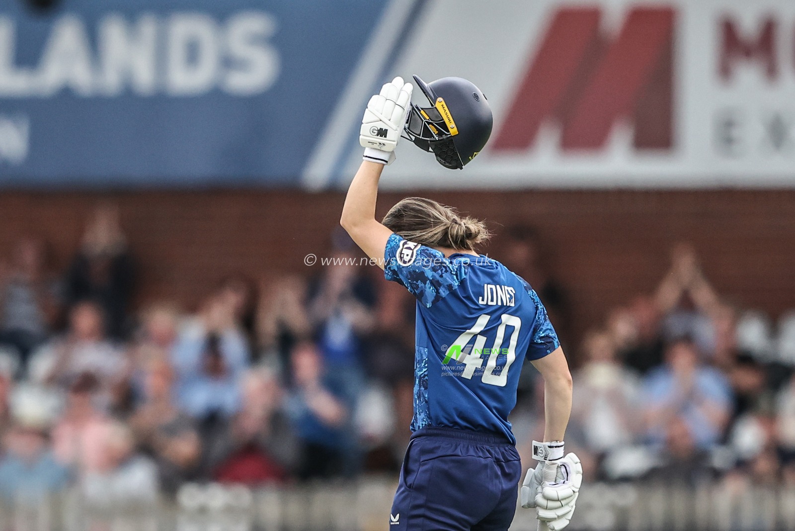 Amy Jones of England celebrates a century (100 runs) during the Metro Bank One Day International match England Women vs West Indies Women at Derbyshire County Cricket Club, Derby, United Kingdom, 30th May 2025

(Photo by Alfie Cosgrove/News Images)