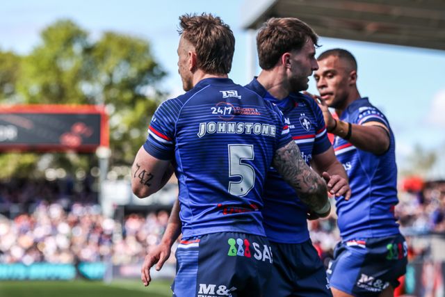 Tom Johnstone of Wakefield Trinity celebrates his try during the Betfred Super League round 8 match Wakefield Trinity vs Bradford Bulls at DIY Kitchens Stadium, Wakefield, United Kingdom on 18 April 2026

(Photo by Alfie Cosgrove/News Images)