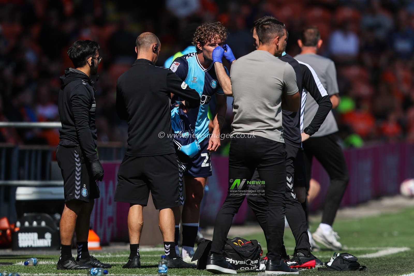 Kieran Sadlier of Wycombe Wanderers receives medical treatment for a bloody nose during the Sky Bet League 1 match Blackpool vs Wycombe Wanderers at Bloomfield Road, Blackpool, United Kingdom, 31st August 2024

(Photo by Gareth Evans/News Images)