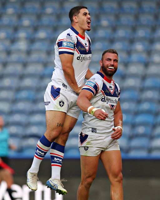Mike McMeeken of Wakefield Trinity celebrates his try with Caleb Hamlin-Uele of Wakefield Trinity during the Betfred Super League round 19 match Huddersfield Giants vs Wakefield Trinity at the Accu Stadium, Huddersfield, United Kingdom, 18th July 2025

(Photo by Sam Eaden/News Images)