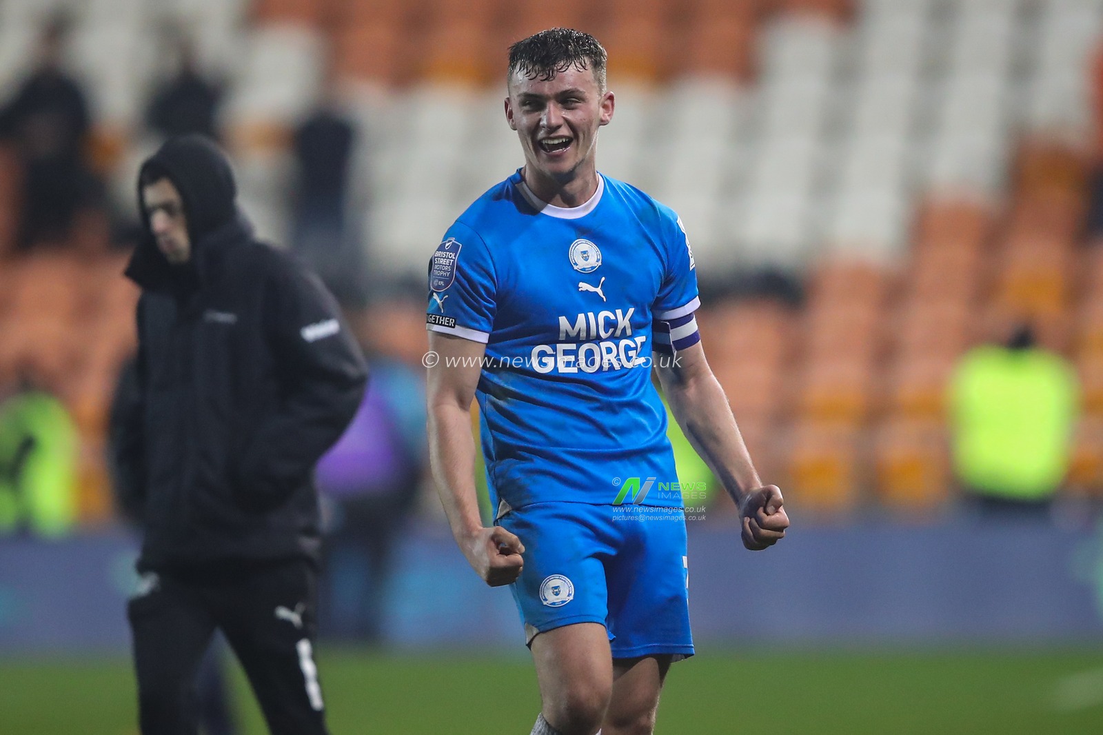 Harrison Burrows of Peterborough United celebrates his teams win after the Bristol Street Motors Trophy Semi-Final match Blackpool vs Peterborough United at Bloomfield Road, Blackpool, United Kingdom, 20th February 2024

(Photo by Gareth Evans/News Images)