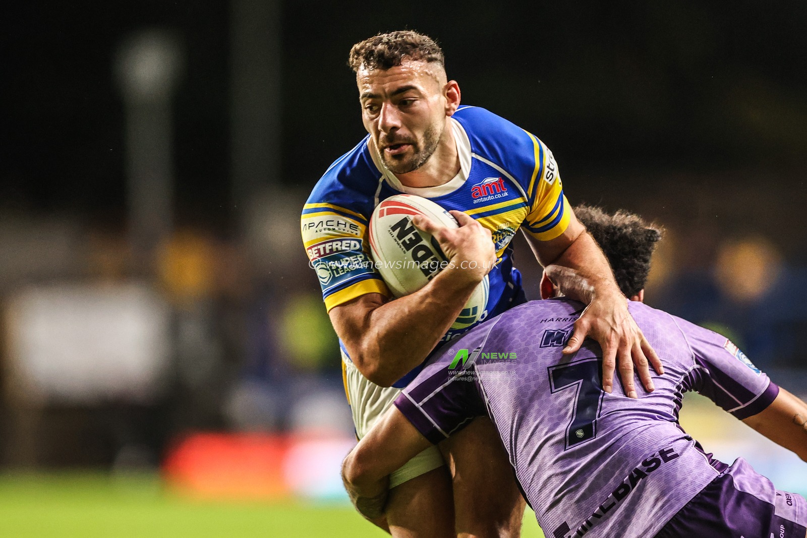 Jake Connor of Leeds Rhinos is tackled by Tyrone May of Hull KR during the Betfred Super League round 23 match Leeds Rhinos vs Hull KR at Headingley Stadium, Leeds, United Kingdom, 21st August 2025

(Photo by Alfie Cosgrove/News Images)