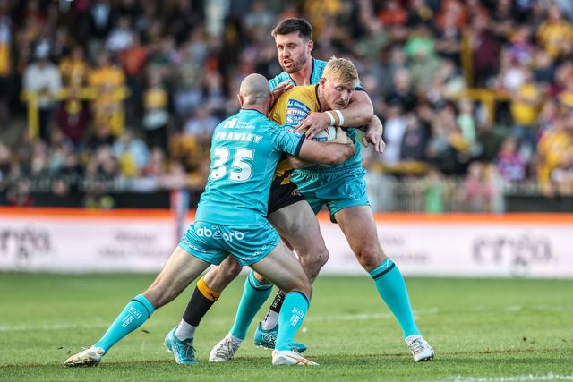 Zac Cini of Castleford Tigers is tackled during the Betfred Super League round 17 match Castleford Tigers vs Huddersfield Giants at The Mend-A-Hose Jungle, Castleford, United Kingdom, 3rd July 2025

(Photo by Alfie Cosgrove/News Images)