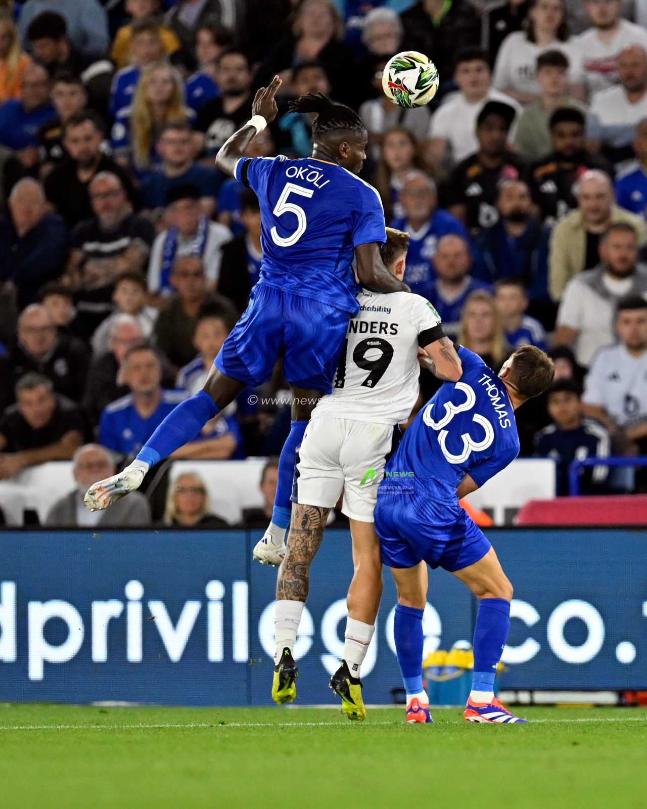 Caleb OKOLI of Leicester City  wins the ball in the air from Luke NORRIS of Tranmere Rovers during the Carabao Cup match Leicester City vs Tranmere Rovers at King Power Stadium, Leicester, United Kingdom, 27th August 2024

(Photo by Mark Dunn/News Images)