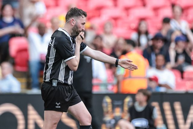 Referee Liam Moore signals a try for Luke Thompson of Wigan Warriors after it goes to the video judge during the Betfred Challenge Cup Final match Wigan Warriors vs Hull KR at Wembley Stadium, London, United Kingdom on 30 May 2026

(Photo by Mark Cosgrove/News Images)