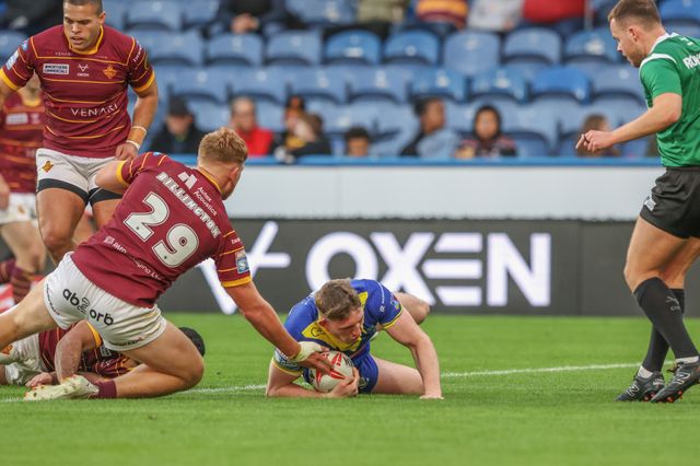 Matty Nicholson of Warrington Wolves goes over for a try during the Betfred Super League Round 26 match Huddersfield Giants vs Warrington Wolves at John Smith's Stadium, Huddersfield, United Kingdom, 14th September 2024

(Photo by Alfie Cosgrove/News Images)