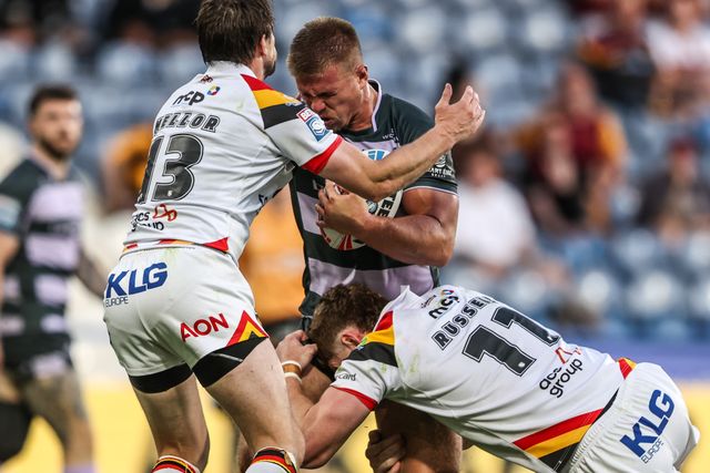 Harry Rushton of Huddersfield Giants is tackled by Joe Mellor of Bradford Bulls and Dan Russell of Bradford Bulls during the Betfred Super League round 18 match Huddersfield Giants vs Bradford Bulls at Accu Stadium, Huddersfield, United Kingdom on 10 July 2026

(Photo by Alfie Cosgrove/News Images)