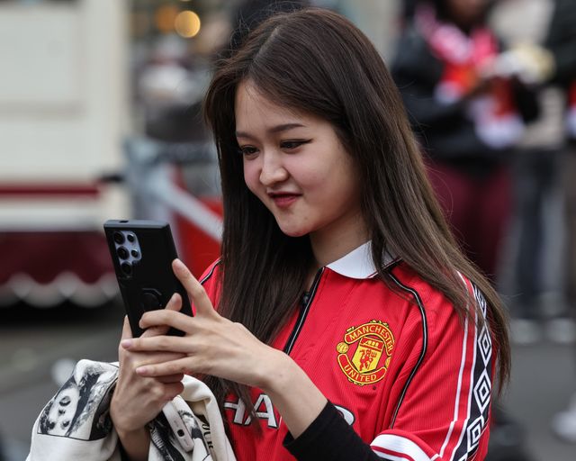 Manchester United fans make their way to the game during the Premier League match Manchester United vs Liverpool at Old Trafford, Manchester, United Kingdom on 03 May 2026

(Photo by Mark Cosgrove/News Images)