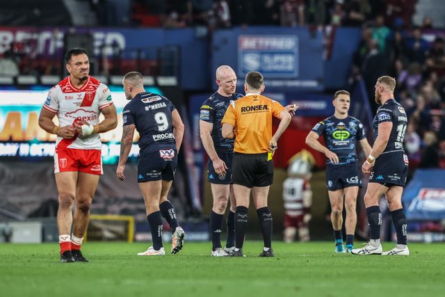 Brad O'neill of Wigan Warriors is given a yellow card by referee  Liam Moore for a dangerous tackle on Tyrone May of Hull KR during the 2025 Betfred Super League Grand Final Hull KR v Wigan Warriors at Old Trafford, Manchester, United Kingdom, 11th October 2025

(Photo by Alfie Cosgrove/News Images)
