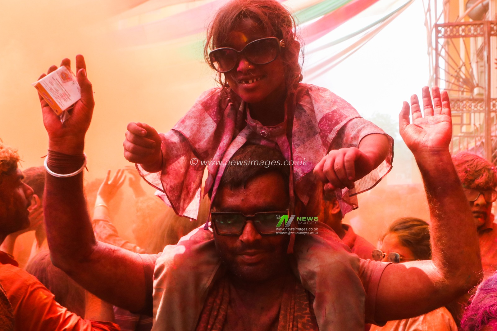 People celebrate the annual Holi festival in Kolkata,India on March 14,2025.Pictures by Debajyoti Chakraborty.The Hindu festival of Holi brings out the wildest, the loudest, and the most colorful celebration imaginable in India or anywhere else. Crowds fill the streets as brightly colored powder and water fill the air. Holi, also called the Festival of Colors, is celebrated with much enthusiasm on the full moon day in the month of Phalgun, which usually corresponds to the month of March. It marks the arrival of spring and the bright colors represent energy, life, and joy. The festival is also associated with the immortal love of Krishna and Radha, so in Mathura, the birth place of Lord Krishna, this day is also celebrated with a special puja, or prayer, the traditional custom of worshipping Lord Krishna, and an even greater exuberance.(Photo: Debajyoti Chakraborty/News Images)