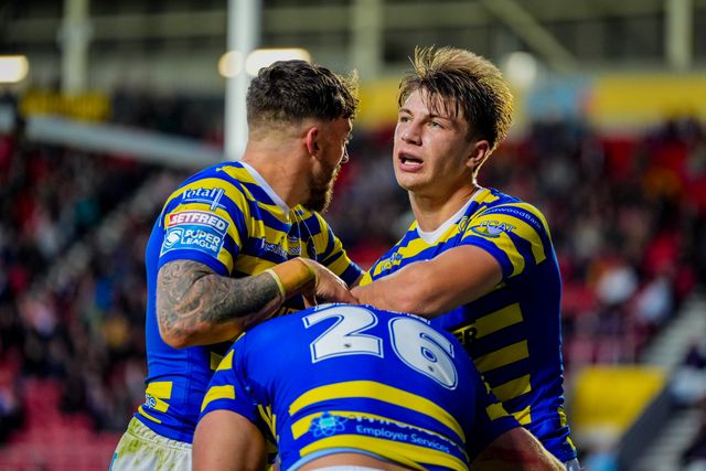 Josh Smith of Warrington Wolves celebrates his try during the Betfred Super League round 14 match St Helens vs Warrington Wolves at The BrewDog Stadium, St Helens, United Kingdom on 11 June 2026

(Photo by Maynard Manyowa/News Images)