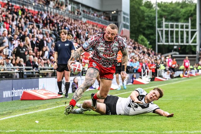 Josh Charnley of Leigh Leopards goes over for a try during the Betfred Super League round 12 match Leigh Leopards vs Hull FC at Leigh Sports Village, Leigh, United Kingdom on 22 May 2026

(Photo by Alfie Cosgrove/News Images)