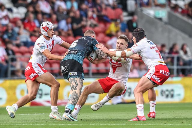 Josh Charley of Leigh Leopards pushes past Matty Lees of St. Helens during the Betfred Super League round 19 match St Helens vs Leigh Leopards at Totally Wicked Stadium, St Helens, United Kingdom, 17th July 2025

(Photo by Alfie Cosgrove/News Images)