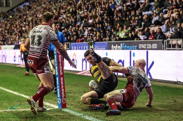Sam Wood of York Knights is tackled by Liam Farrell of Wigan Warriors during the Betfred Super League round 5 match Wigan Warriors vs York Knights at The Brick Community Stadium, Wigan, United Kingdom on 19 March 2026

(Photo by Alfie Cosgrove/News Images)