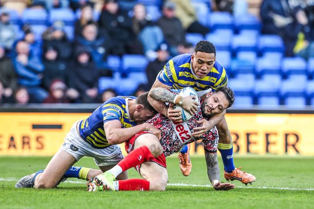 Gareth O'Brien of Leigh Leopards is tackled by Sam Stone of Warrington Wolves during the Betfred Challenge Cup Quarter Final match Warrington Wolves vs Leigh Leopards at The Halliwell Jones Stadium, Warrington, United Kingdom on 11 April 2026

(Photo by Alfie Cosgrove/News Images)