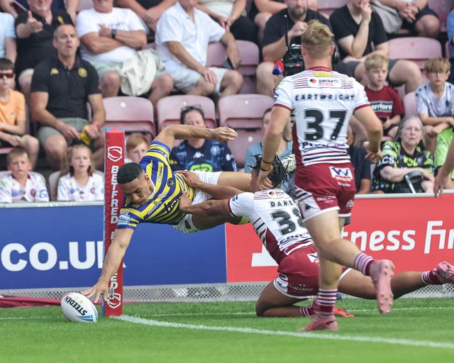 Albert Hopoate of Warrington Wolves goes over for a try during the Betfred Super League round 18 match Wigan Warriors vs Warrington Wolves at The Brick Community Stadium, Wigan, United Kingdom on 10 July 2026

(Photo by Mark Cosgrove/News Images)
