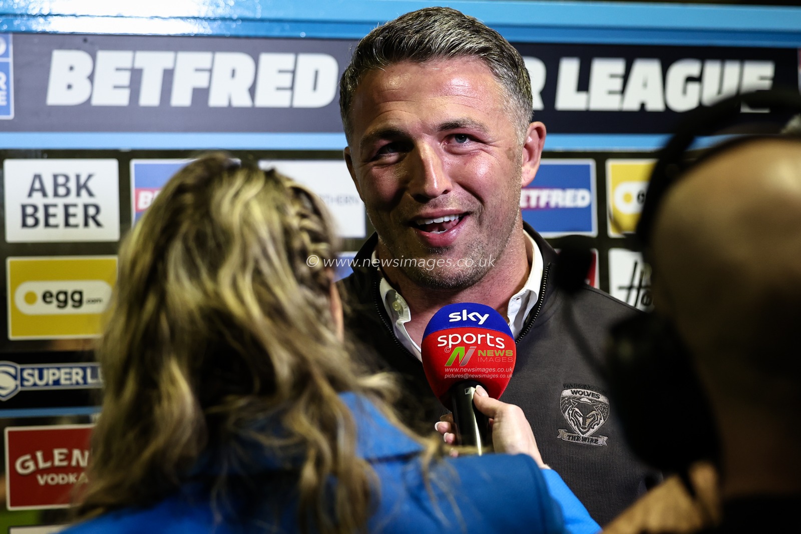 Sam Burgess Head Coach of Warrington Wolves is interviews by Jenna Brooks during the Betfred Super League Round 6 match Warrington Wolves vs Leeds Rhinos at Halliwell Jones Stadium, Warrington, United Kingdom, 28th March 2025

(Photo by Mark Cosgrove/News Images)