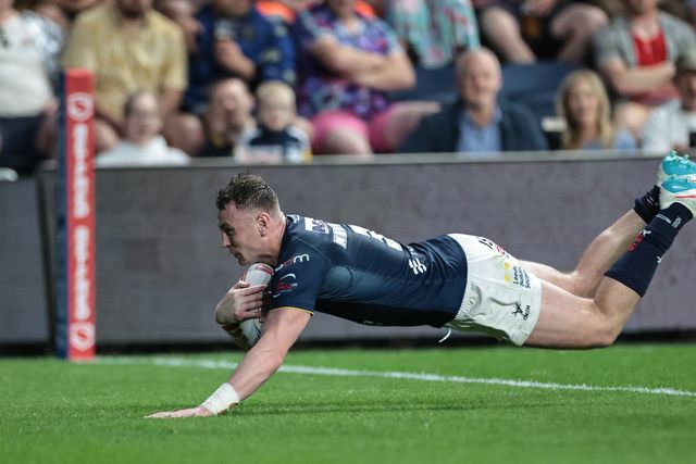 Harry Newman of Leeds Rhinos goes over for a try during the Betfred Super League round 12 match Leeds Rhinos vs Huddersfield Giants at AMT Headingley Stadium, Leeds, United Kingdom on 22 May 2026

(Photo by Mark Cosgrove/News Images)