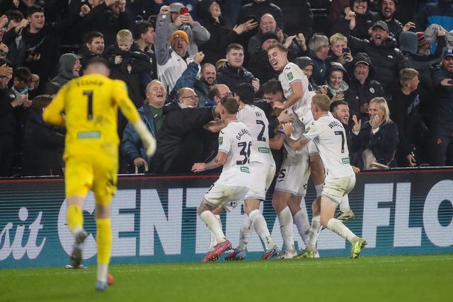 Cameron Burgess of Swansea City celebrates scoring his teams third and winning goal during the Carabao Cup 3rd Round Swansea City vs Nottingham Forest at Swansea.com Stadium, Swansea, United Kingdom, 17th September 2025

(Photo by Andrew Lewis/News Images)