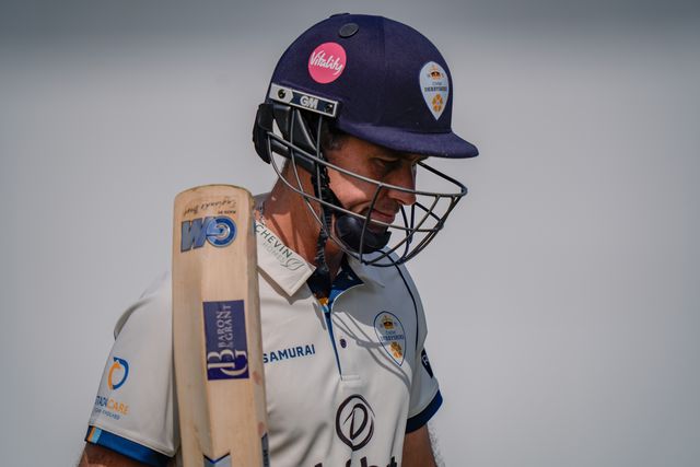 Dejected Wayne Madsen raises his bat to the crowd as he walks off after being caught by Ed Middleton off the bowling of Will Williams during the County Championship Division Two Derbyshire v Gloucestershire at The Central Co-Op County Ground, Derby, United Kingdom on 26 April 2026

(Photo by Maynard Manyowa/News Images)