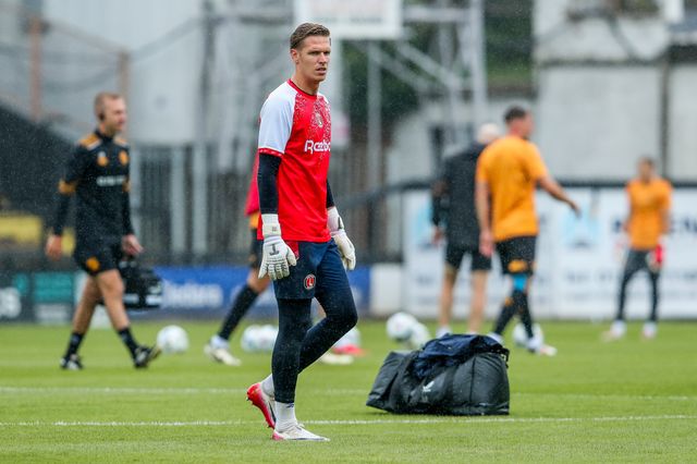 Thomas Kaminski of Charlton Athletic warms up prior to the Pre-season friendly match Cambridge United vs Charlton Athletic at Abbey Stadium, Cambridge, United Kingdom, 26th July 2025

(Photo by Izzy Poles/News Images)