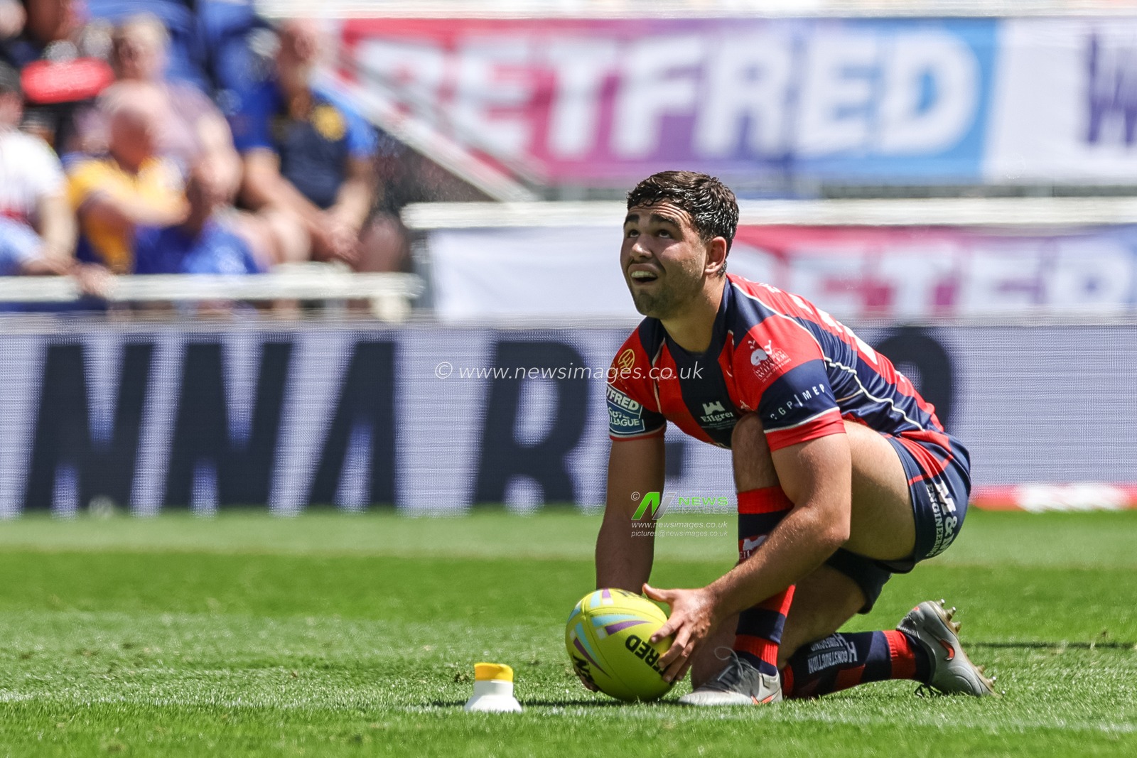 Jack Sinfield of Wakefield Trinity places the ball for a goal kick during the Betfred Super League Magic Weekend match Wakefield Trinity vs Castleford Tigers at Hill Dickinson Stadium, Liverpool, United Kingdom on 05 July 2026

(Photo by Mark Cosgrove/News Images)