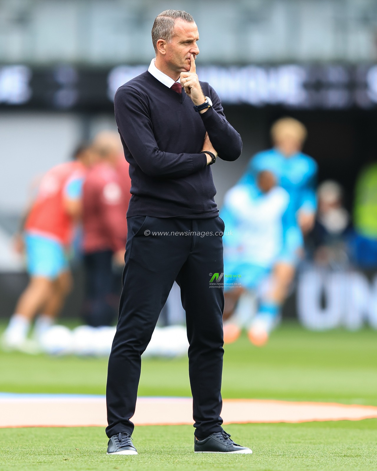 Burnley manager Nicky Hayen watches teams warms up ahead of the Sky Bet Championship match Burnley vs West Ham United at Turf Moor, Burnley, United Kingdom on 16 August 2026

(Photo by Jorge Horsted/News Images)
