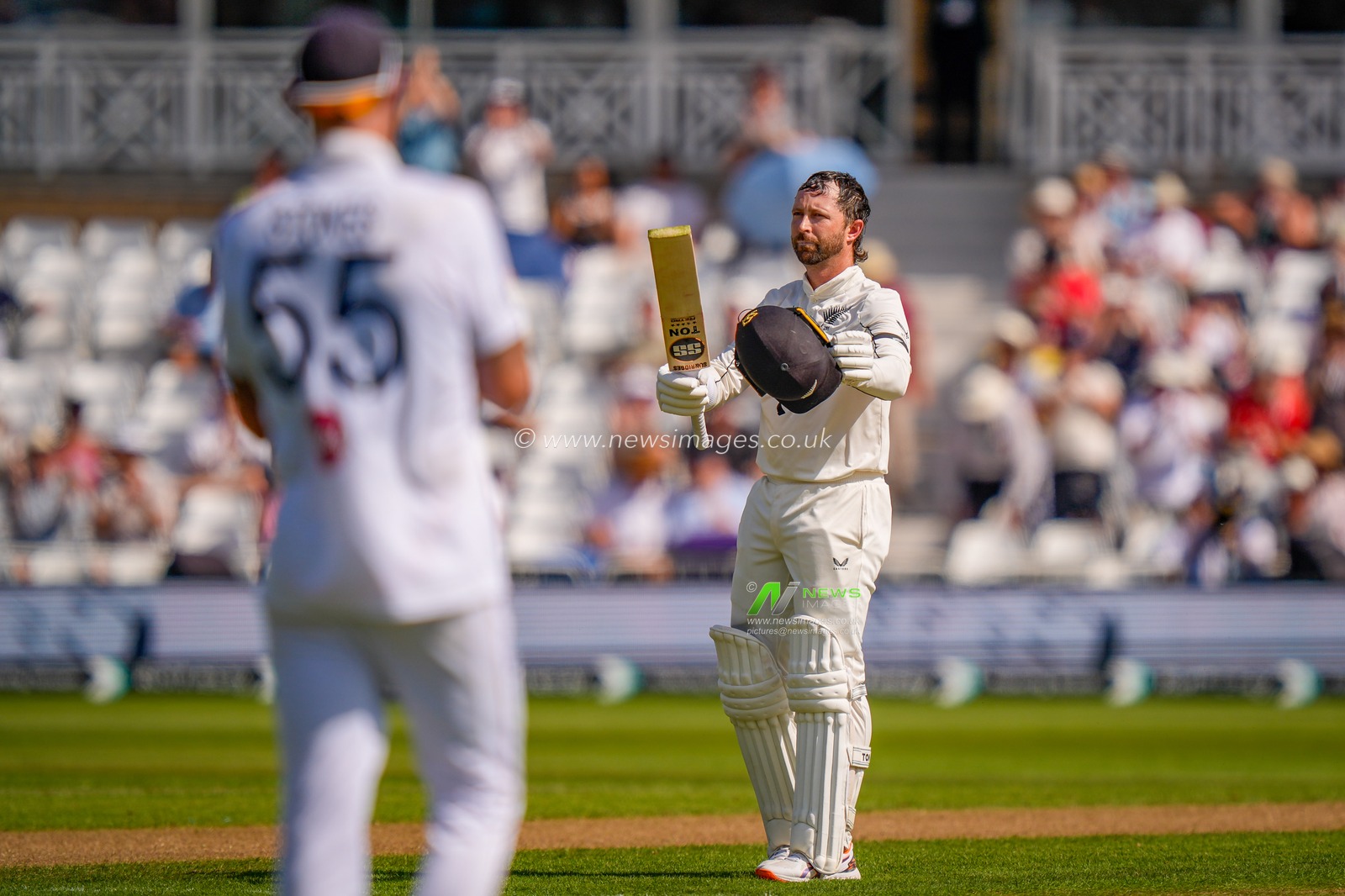 Devon Conwayof New Zealand celebrates scoring his 100 runs and raises his bat for a century as England captain Ben Stokes applauds during the 3rd Rothesay Test Match Day 1 match England vs New Zealand at Trent Bridge, Nottingham, United Kingdom on 25 June 2026

(Photo by Maynard Manyowa/News Images)
