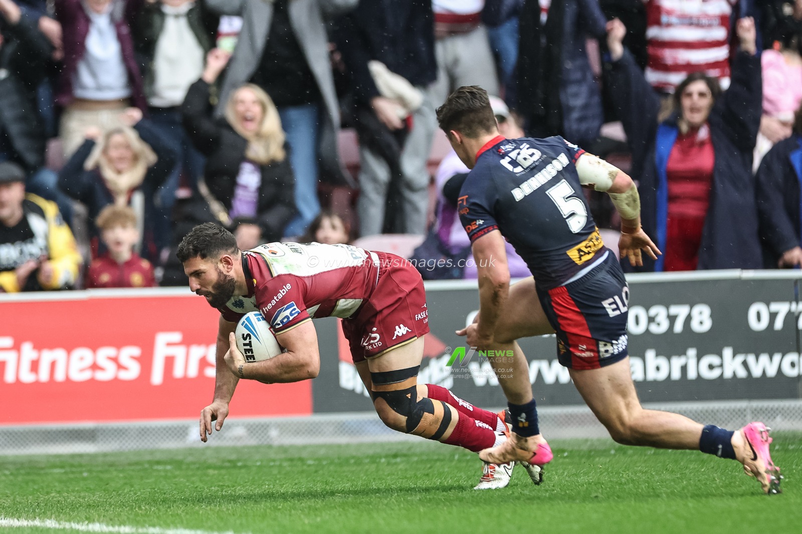 Abbas Miski of Wigan Warriors goes over for a try to make it 22-14 during the Betfred Super League Round 8 match Wigan Warriors vs St Helens at The Brick Community Stadium, Wigan, United Kingdom, 18th April 2025

(Photo by Mark Cosgrove/News Images)