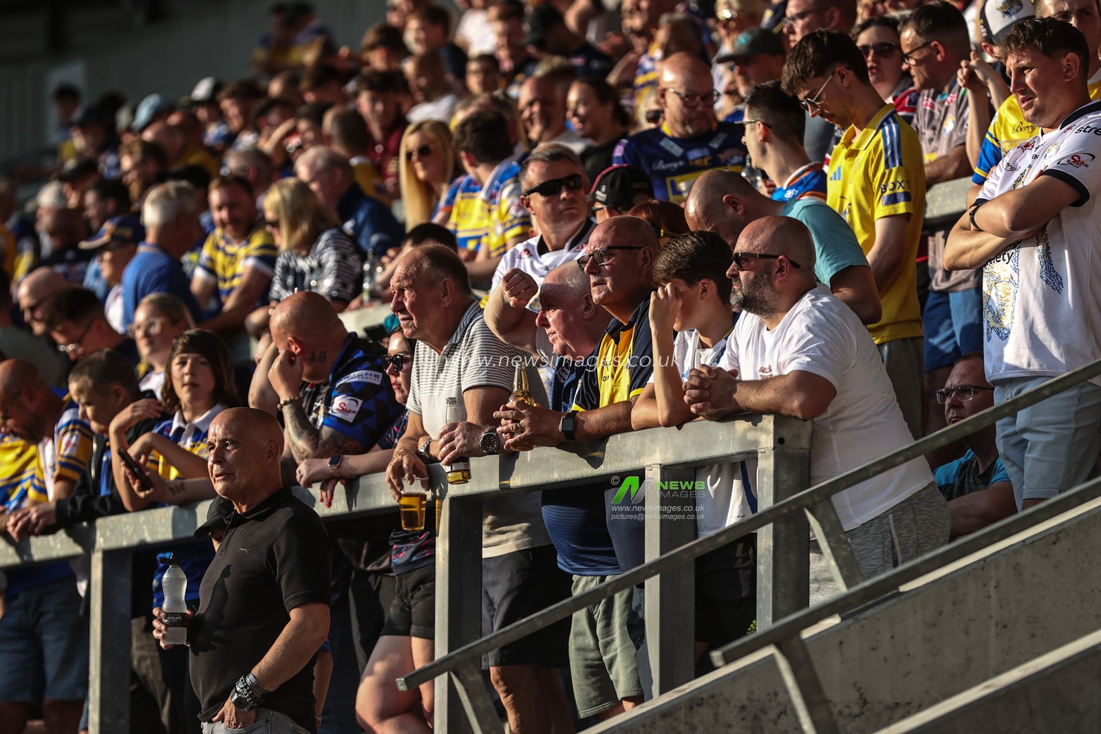 Leeds fans look on during the Betfred Super League round 15 match St Helens vs Leeds Rhinos at Totally Wicked Stadium, St Helens, United Kingdom, 20th June 2025

(Photo by Alfie Cosgrove/News Images)