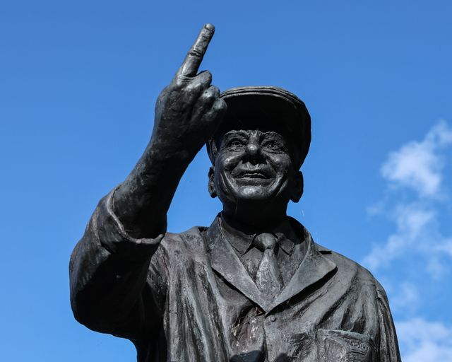 Flowers are laid at The Harold 'Dickie' Bird MBE, OBE statue after his passing today at the age of 92, Barnsley, United Kingdom, 23rd September 2025

(Photo by Mark Cosgrove/News Images)