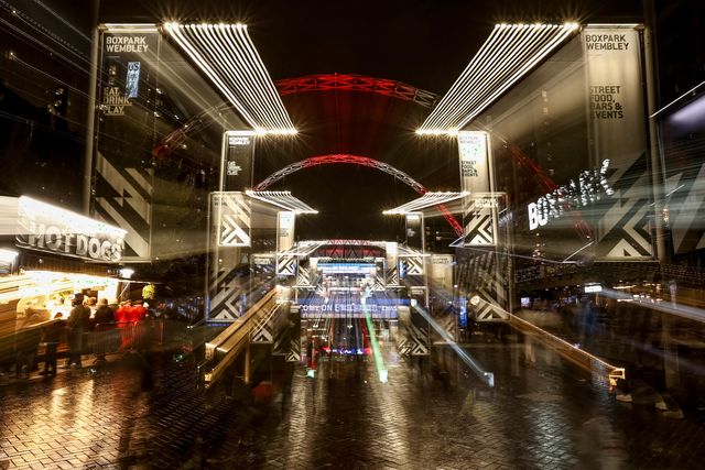 Fans make their way up Olympic Way as the Wembley Arch is lit on White and Red for England during the FIFA World Cup Qualifiers round 9 match England vs Serbia at Wembley Stadium, London, United Kingdom, 13th November 2025

(Photo by Alfie Cosgrove/News Images)

*** GER AUT SUI OUT ***