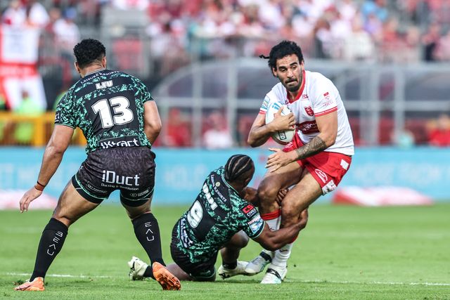 Tyrone May of Hull KR is tackled by Edwin Ipape of Leigh Leopards during the Betfred Super League round 15 match Hull KR vs Leigh Leopards at Sewell Group Craven Park, Hull, United Kingdom on 19 June 2026

(Photo by Alfie Cosgrove/News Images)