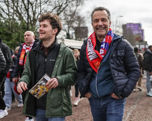Manchester United fans make their way to Old Trafford during the Premier League match Manchester United vs Crystal Palace at Old Trafford, Manchester, United Kingdom on 01 March 2026

(Photo by Mark Cosgrove/News Images)