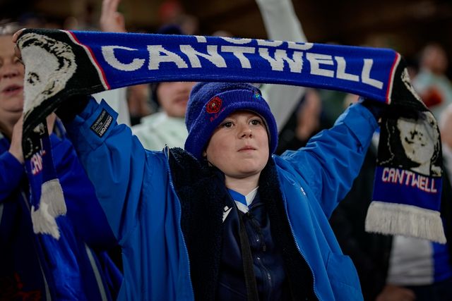 A fan holds a scarf of Todd Cantwell of Blackburn Rovers as Blackburn fans celebrate their team victory during the Sky Bet Championship match Sheffield United vs Blackburn Rovers at Bramall Lane, Sheffield, United Kingdom on 22 April 2026

(Photo by Maynard Manyowa/News Images)