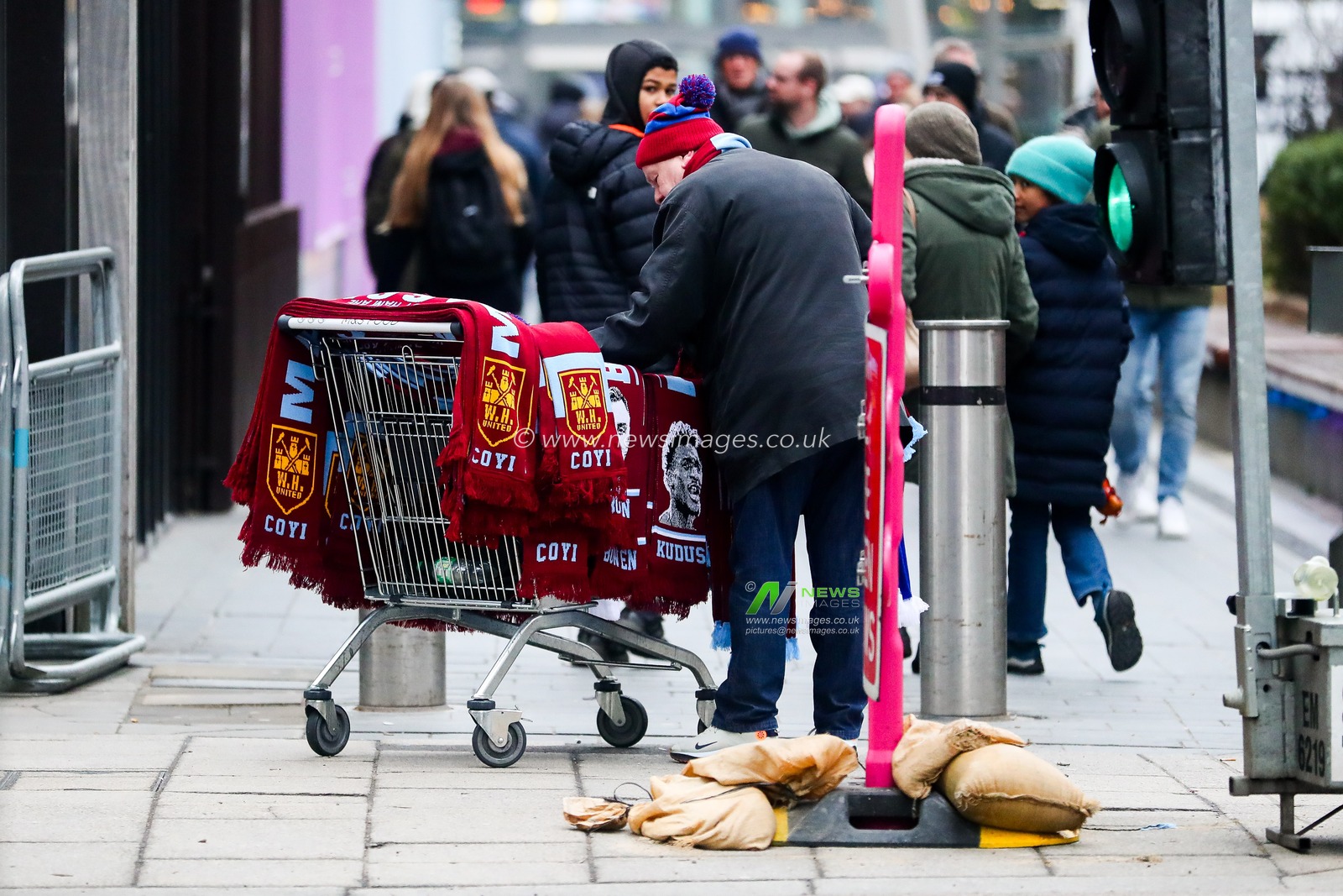 Merch sellers sell match scarves outside of Westfield prior to the Premier League match West Ham United vs Crystal Palace at London Stadium, London, United Kingdom, 18th January 2025

(Photo by Izzy Poles/News Images)