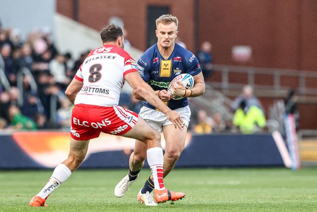 Cooper Jenkins of Leeds Rhinos is tackled by Alex Walmsley of St Helens during the Betfred Super League round 13 match Leeds Rhinos vs St Helens at AMT Headingley Stadium, Leeds, United Kingdom on 04 June 2026

(Photo by Alfie Cosgrove/News Images)