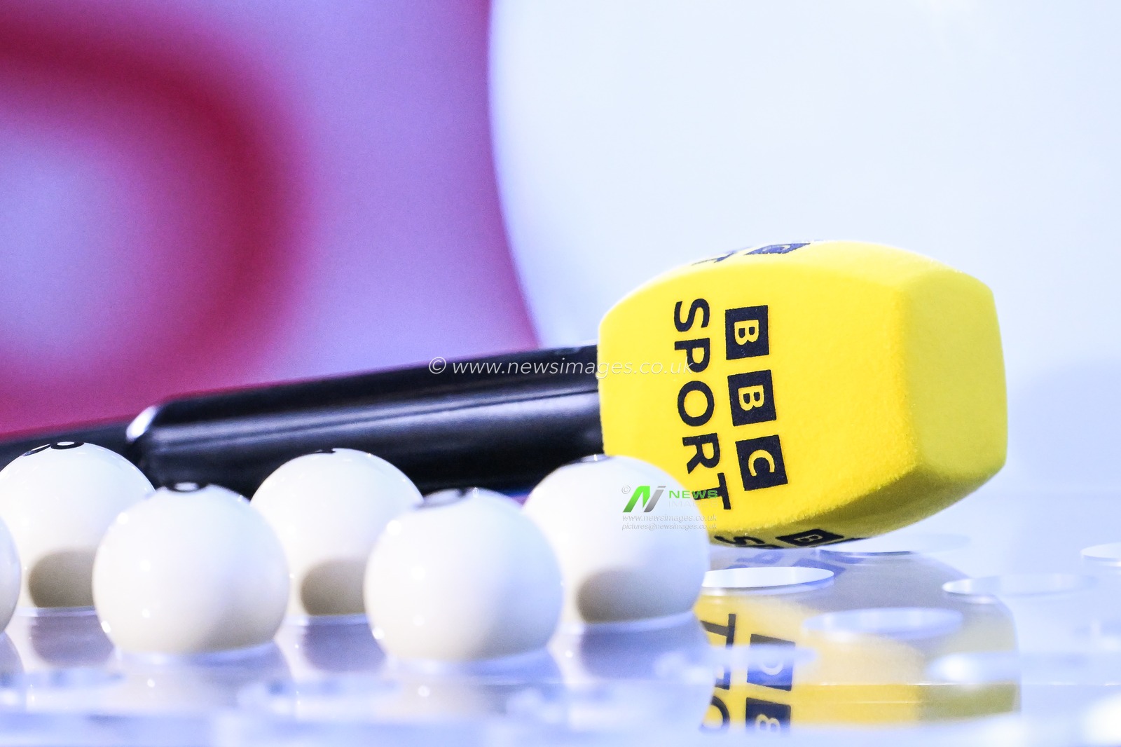 BBC Sport microphone and the Challenge Cup numbered balls on a table before of the challenge cup draw ahead of the Betfred Super League Round 1 match St Helens vs Salford Red Devils at Totally Wicked Stadium, St Helens, United Kingdom, 15th February 2025

(Photo by Craig Thomas/News Images)
